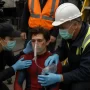 Professional film set photography showing young male actor in Spider-Man costume