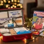 Holiday lights and first‑aid kit representing celebrity Christmas injury safety
