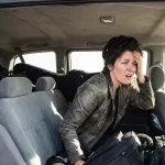 Female pop singer hitting her head on the roof of a minivan during tour travel causing a sudden head and neck injury