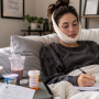 Rosanna Pansino Jaw Injury Recovery After Boat Fall Female content creator recovering at home after jaw injury with medical notes and soft food nearby