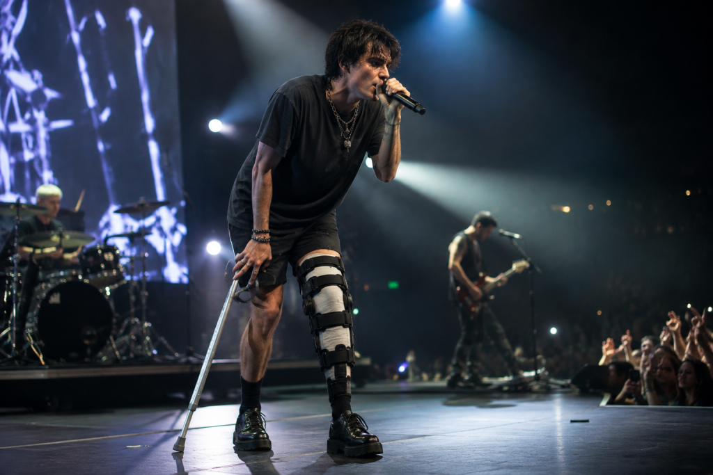 Rock singer performing while recovering from leg injury