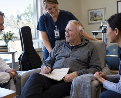 Older singer recovering after brain shunt surgery with medical support