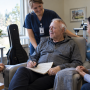 Older singer recovering after brain shunt surgery with medical support