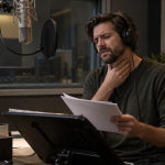 Voice actor experiencing vocal strain during intensive recording session