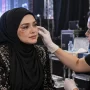 Siti Nurhaliza's Facial Injuries After a Concert Rehearsal Fall Female singer receiving medical attention for facial bruising backstage