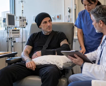 Tattooed drummer receiving medical care after nerve surgery