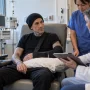 Tattooed drummer receiving medical care after nerve surgery